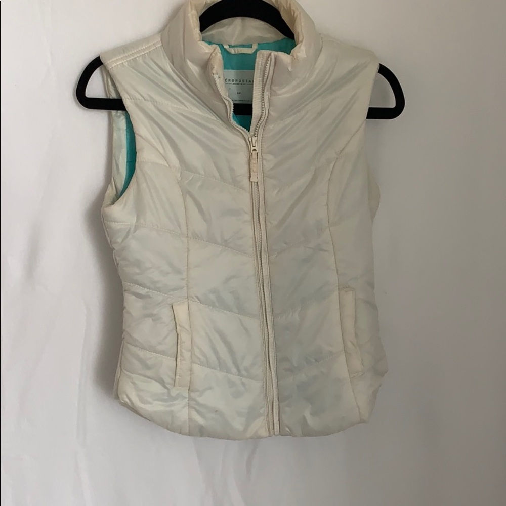 White vest.